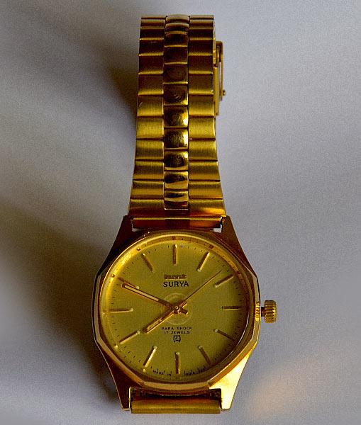 Hmt best sale golden watch