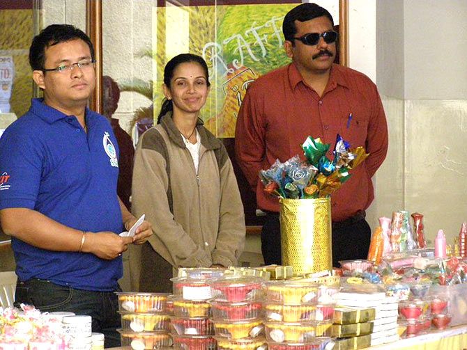 Bhavesh Bhatia with Neeta (centre) at a candle exhibition