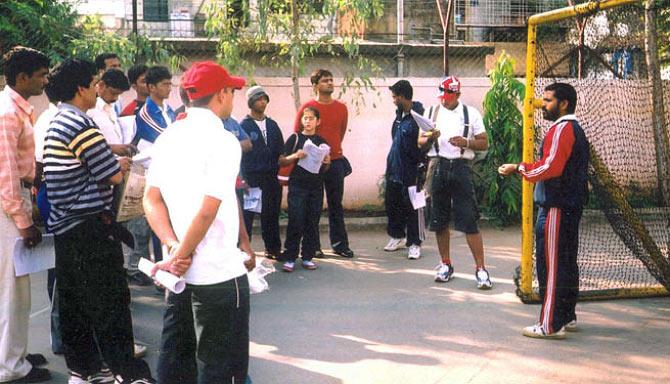 Raju Dabhade training students for Roll Ball