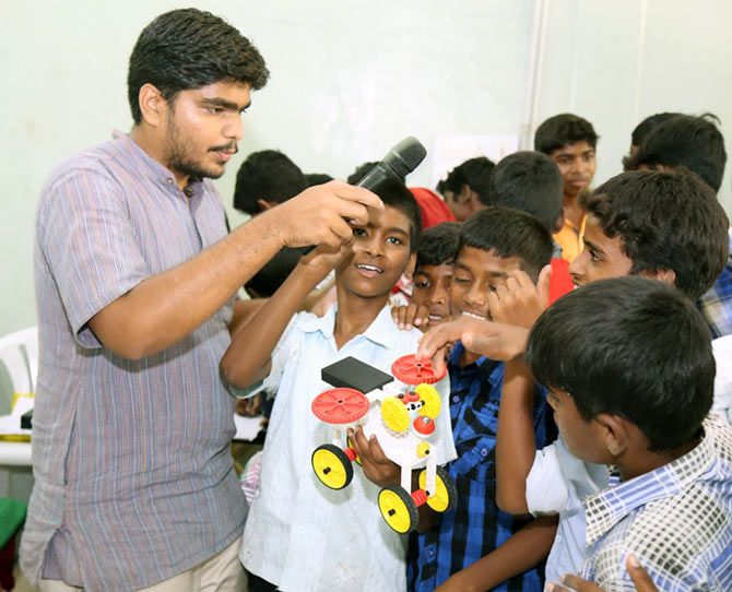 Padmanabhan interacting with kids