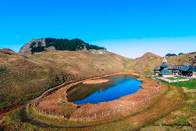 The holy Parashar Lake glistens in the daylight. 