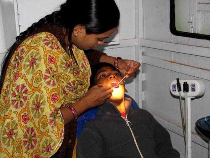 Dr Preeti Adil Chandrakar attends a patient in rural Chhatisgarh