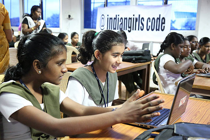 School girls participate a robotics workshop