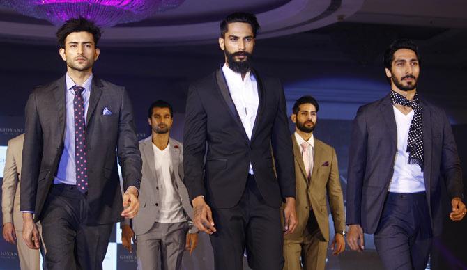 Models showcase the Giovani range of suits