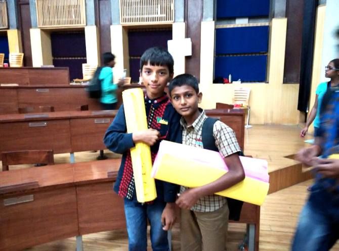 Aman (right) chose to run an LC because he wanted to lend a helping hand to his classmates and other children in his community who do not have access to schools