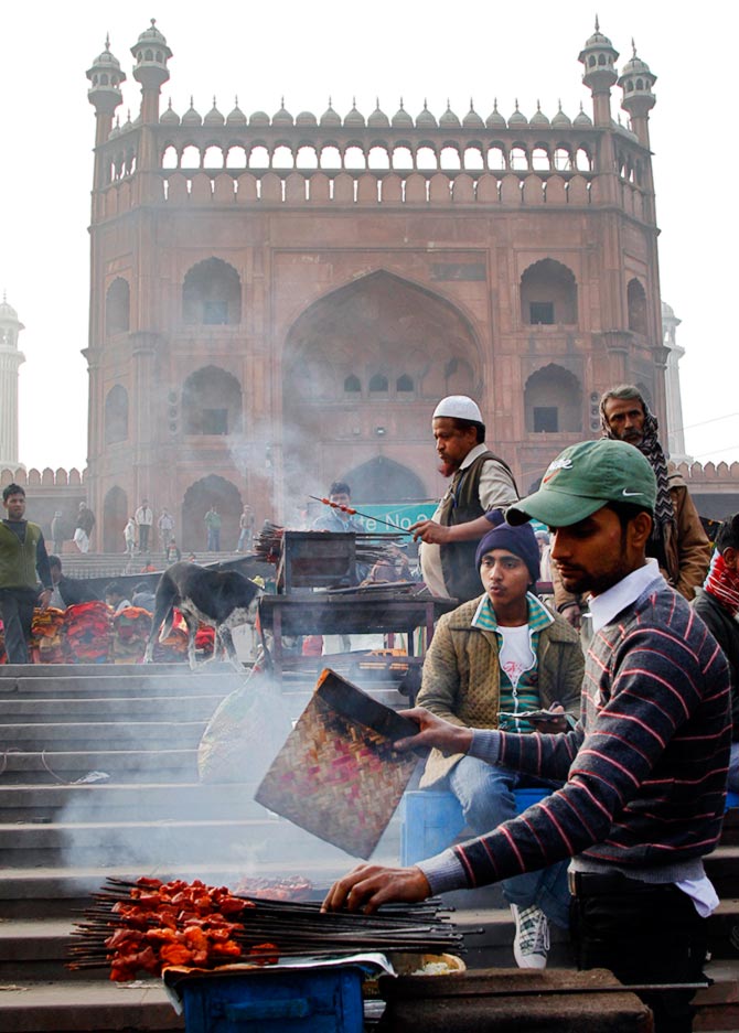 Vendors roast mutton outside the Jama Masjid (Grand Mosque) in the old quarters of Delhi.