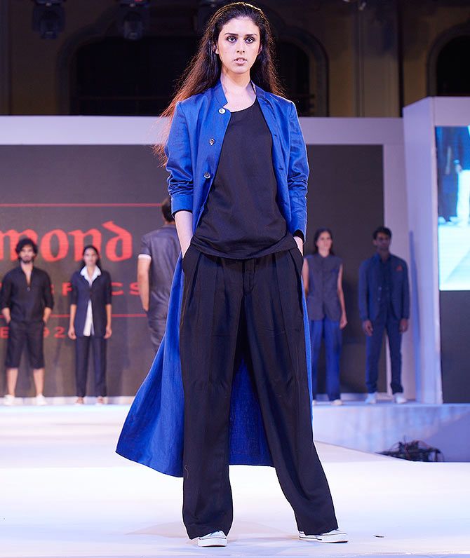 A model wears a creation by Suket Dhir for Raymond India