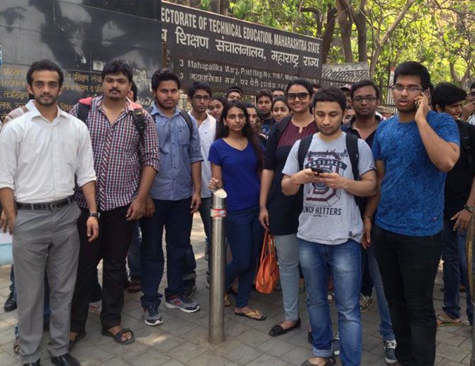Students gather outside the DTE office in Mumbai