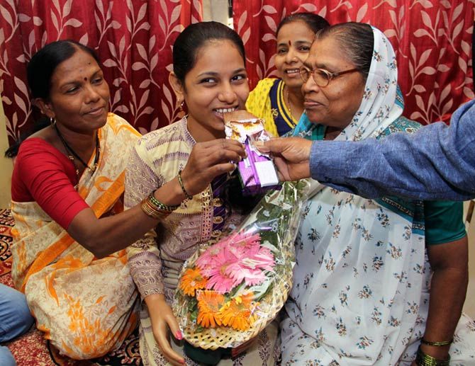 Monika More celebrates her success with her family in Ghatkopar