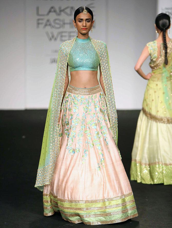 A model presents a Divya Reddy collection