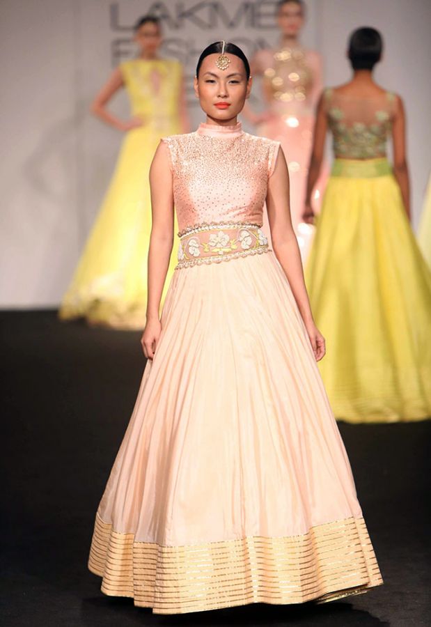 A model presents a Divya Reddy collection