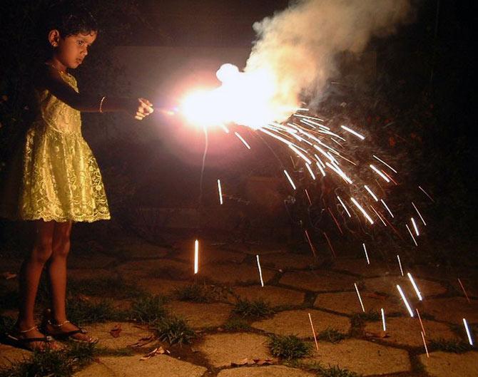 Bursting crackers on Vishu