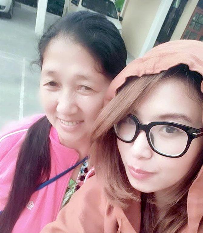 Fashion designer Diming Rubu with her mother