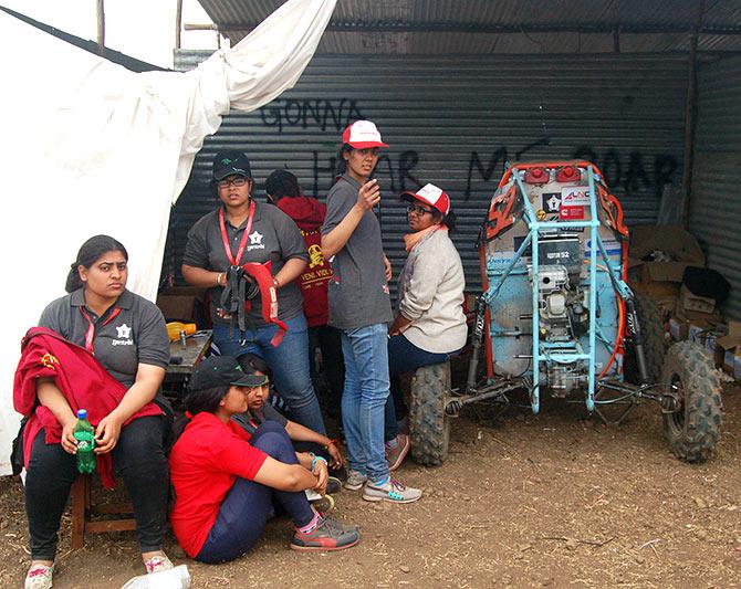 Rashi Bagadia (standing, fifth from left), peps up her team as they have a task at hand, which this all-girls team from Delhi is sure they can accomplish.