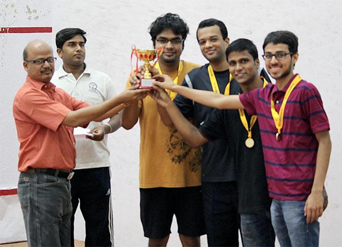 Sabyasachi with his squash team