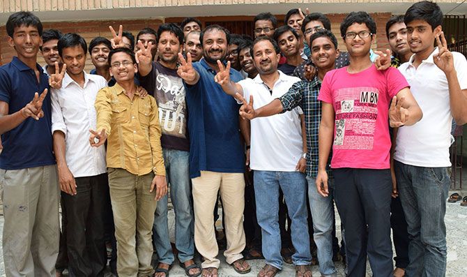 Anand Kumar of Super30 celebrates with his students