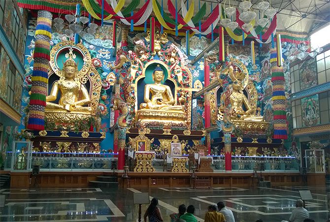 The golden statues at Namdroling monastery.