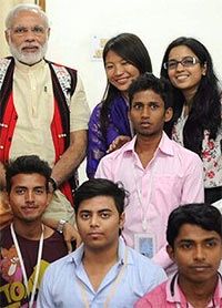 Prime Minister Narendra Modi with Temsutula Imsong and other Sakaar volunteers