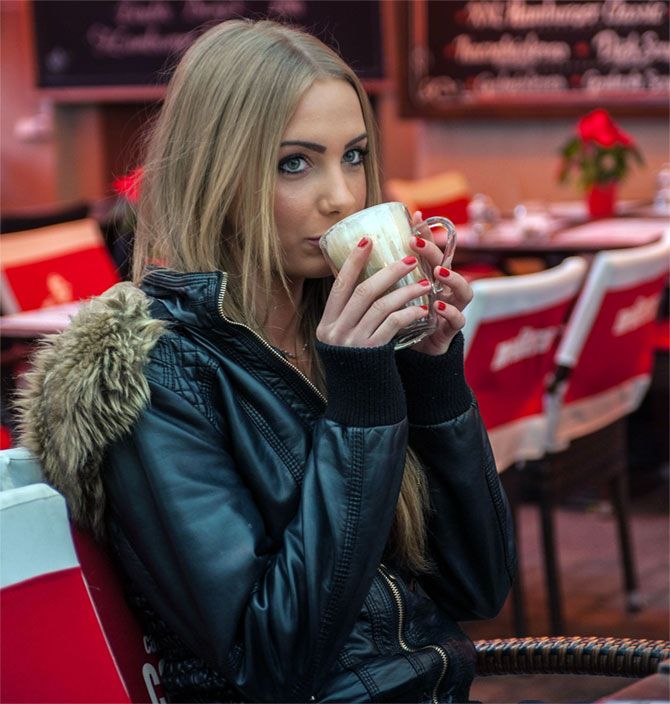 girl sipping coffee 