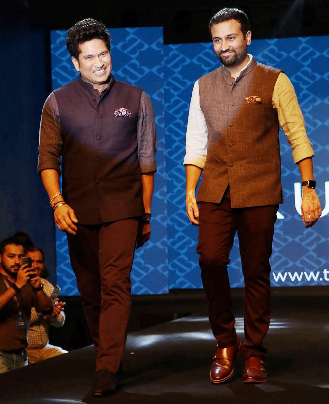 Sachin Tendulkar and Kulin Lalbhai, executive director at Arvind Ltd. 