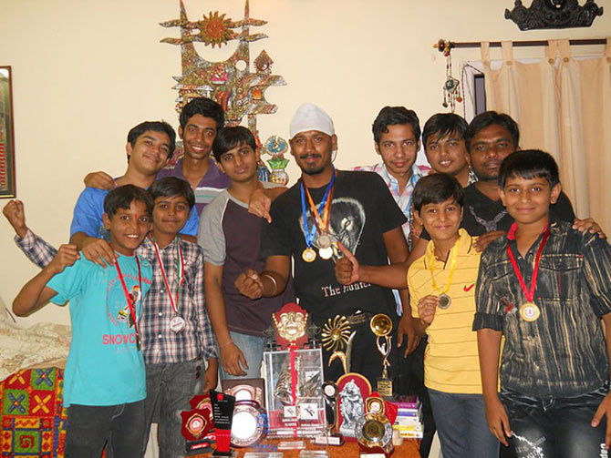 Anshul with his awards