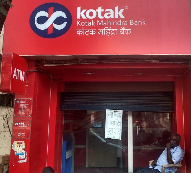 A security guard outside a bank in Mumbai, November 14.