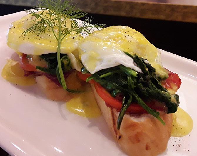  Poached Egg with Confit Tomatoes, Streaky Bacon on Grilled Bruschetta