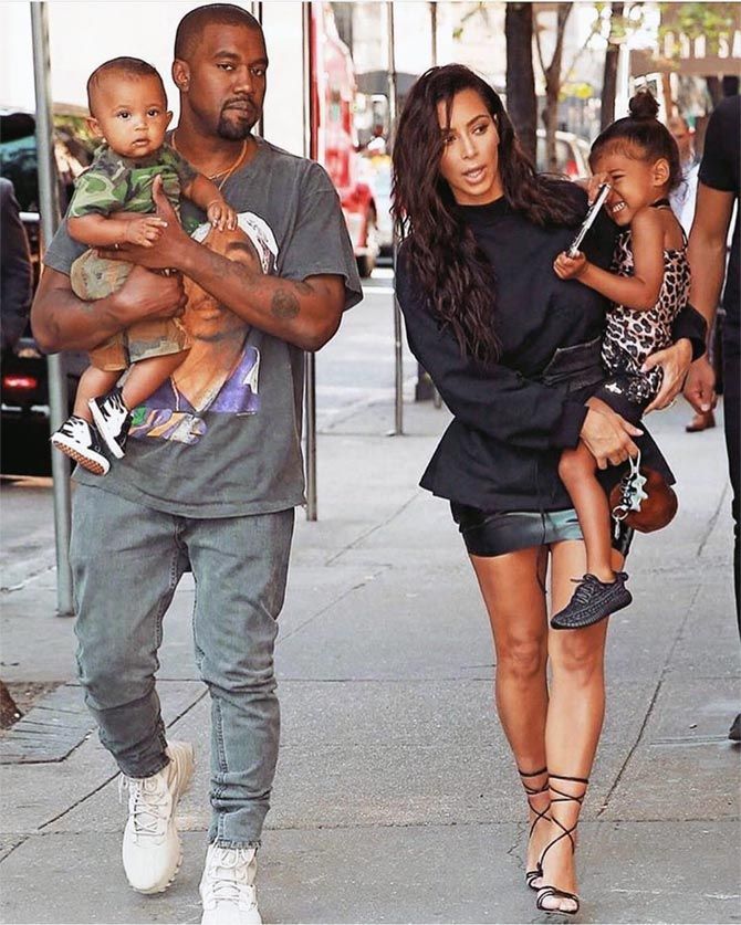 Kanye West and Kim with kids