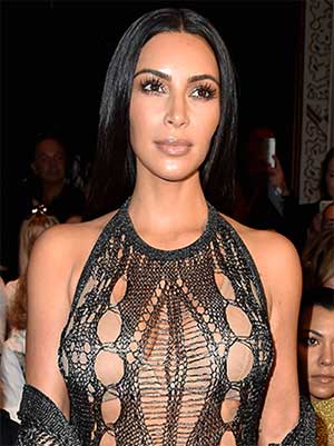 Kim Kardashian leaves little to the imagination! - Rediff.com