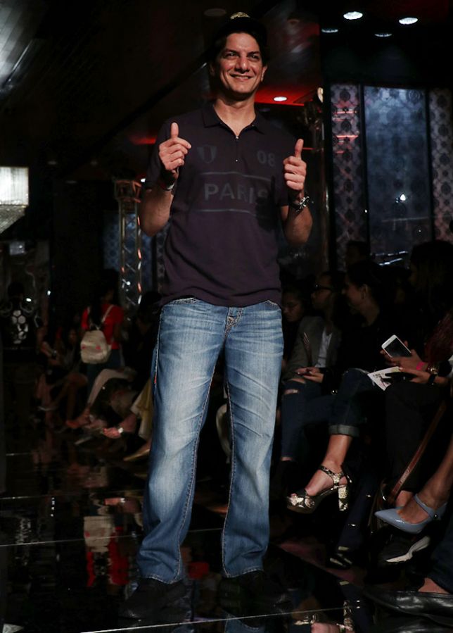DJ Aqeel, dressed casually in blue denims and a tee, beamed under the spotlight