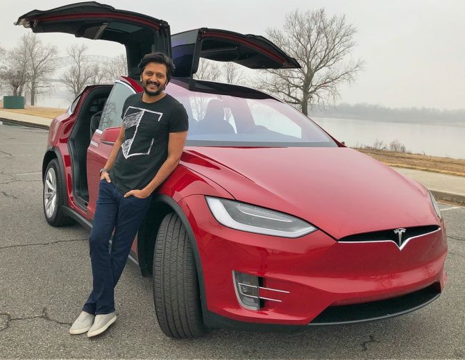 Riteish Deshmukh's with his Tesla Model X.