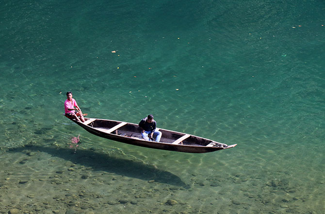 On the crystal clear Umngot river in Dawki, Meghalaya.