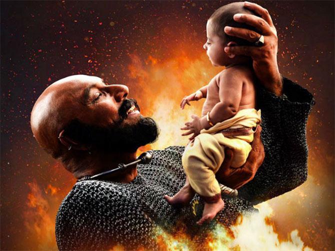 Katappa cradles baby Baahubali