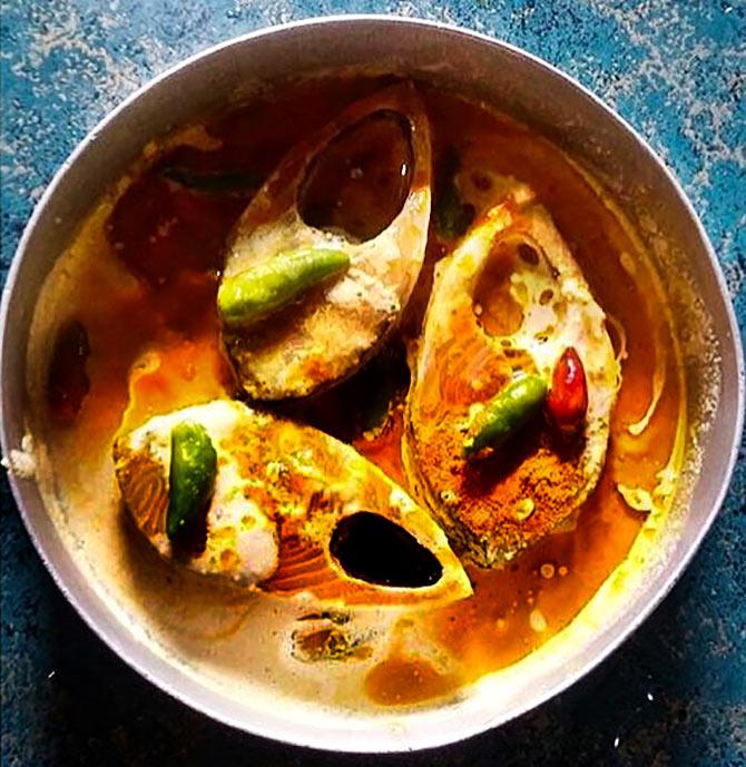 cooking Ilish 