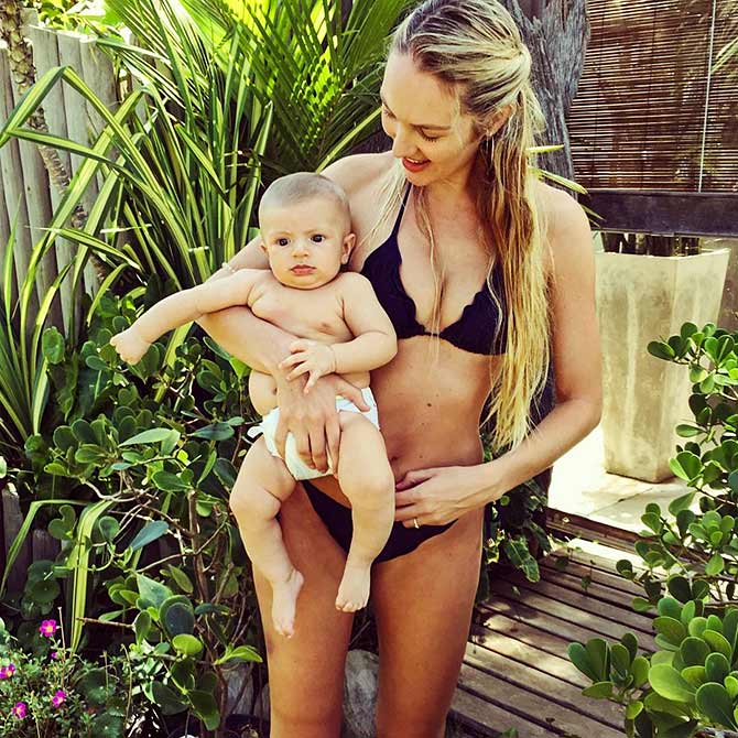 This model's tiny tot is stealing hearts - Rediff.com