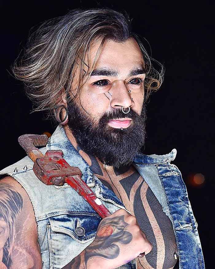 Karan Sidhu is the first in India to tattoo his eyes completely black |  Metro News