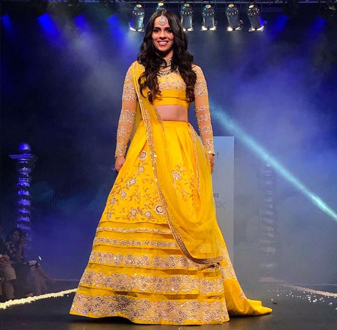 Another Olympian, Saina Nehwal  looked gorgeous as she sashayed down the ramp at the Bangalore Times Fashion Week in Oct 2017