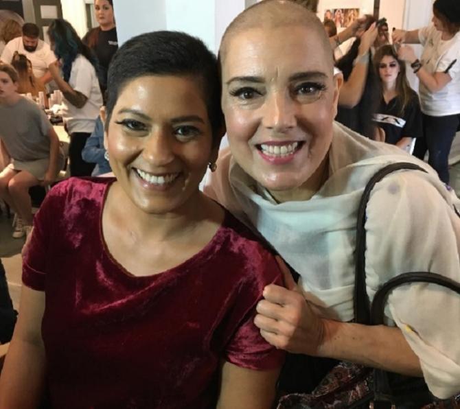 Tina Sharma and Mary Ann DAchille, two of the breast cancer survivors who walked the ramp for Premal Badiani.