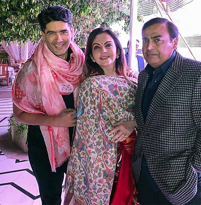 Nita and Mukesh Ambani with designer Manish Malhotra at their daughter Isha's pre-wedding festivities in Udaipur. Photograph: Manish Malhotra/Instagram