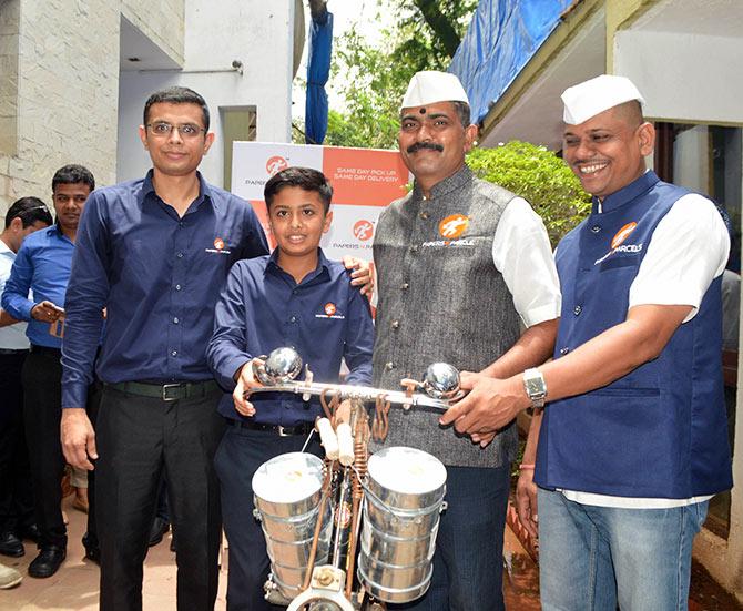 Ghanshyam Parek with Tilak Mehta and dabbawallas