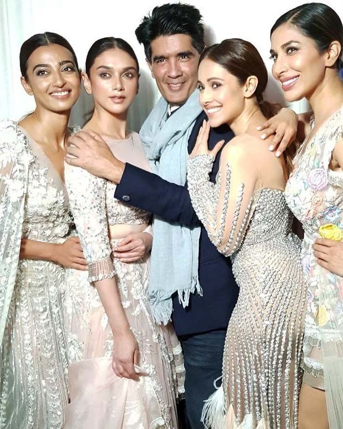 Manish Malhotra with the women