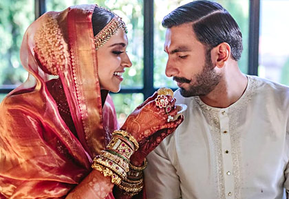 deepika padukone feeds ranveer singh on their wedding day