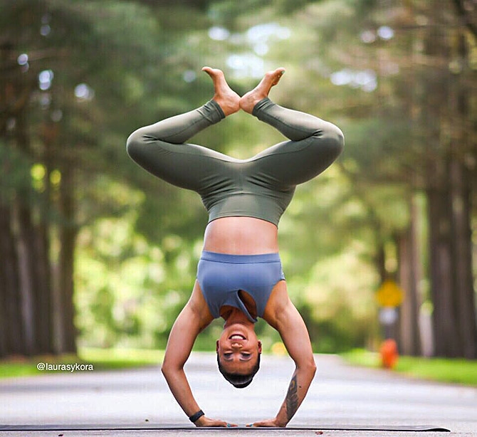 The yoga teacher who makes the handstand look SEXY - Rediff.com Get Ahead