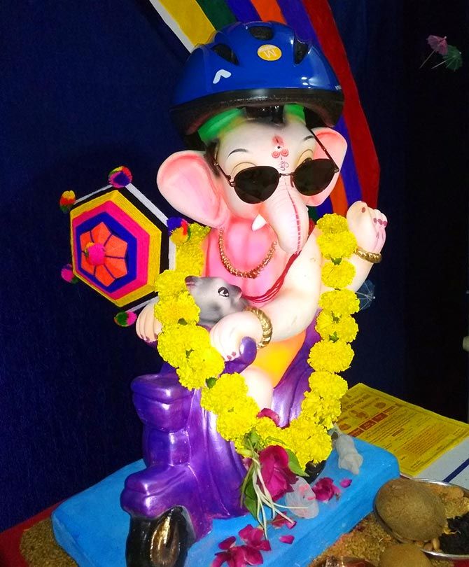 So cute! Ganesha wears a helmet - Rediff.com Get Ahead