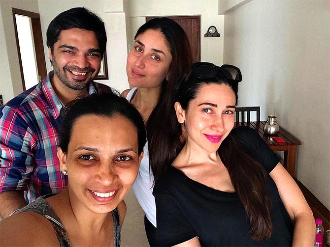 Rujuta Diwekar and her husband, Gaurav Punj, with Kareena and Karisma Kapoor.