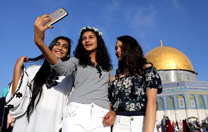 Tourists take a selfie in Jerusalem