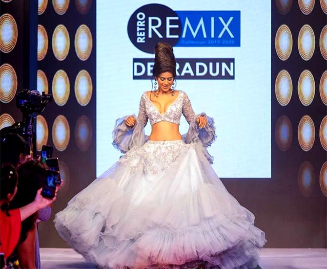 Nia Sharma walks the ramp for Streax Professional