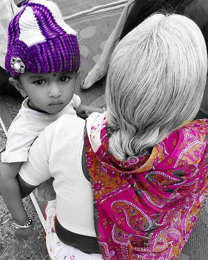 In granny's arms. Photograph: Hemantkumar Shivsharan/Rediff.com