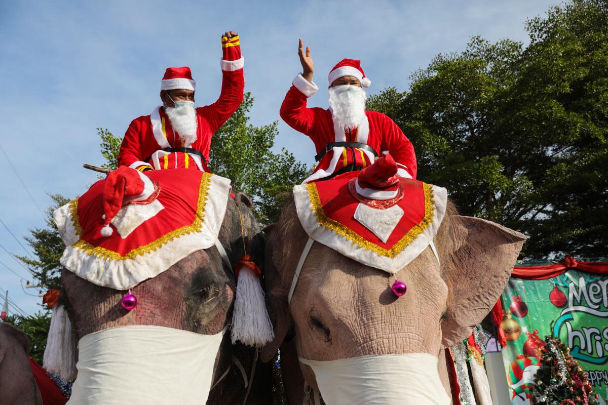 Santa Claus in Thailand delivers face masks ahead of Christmas