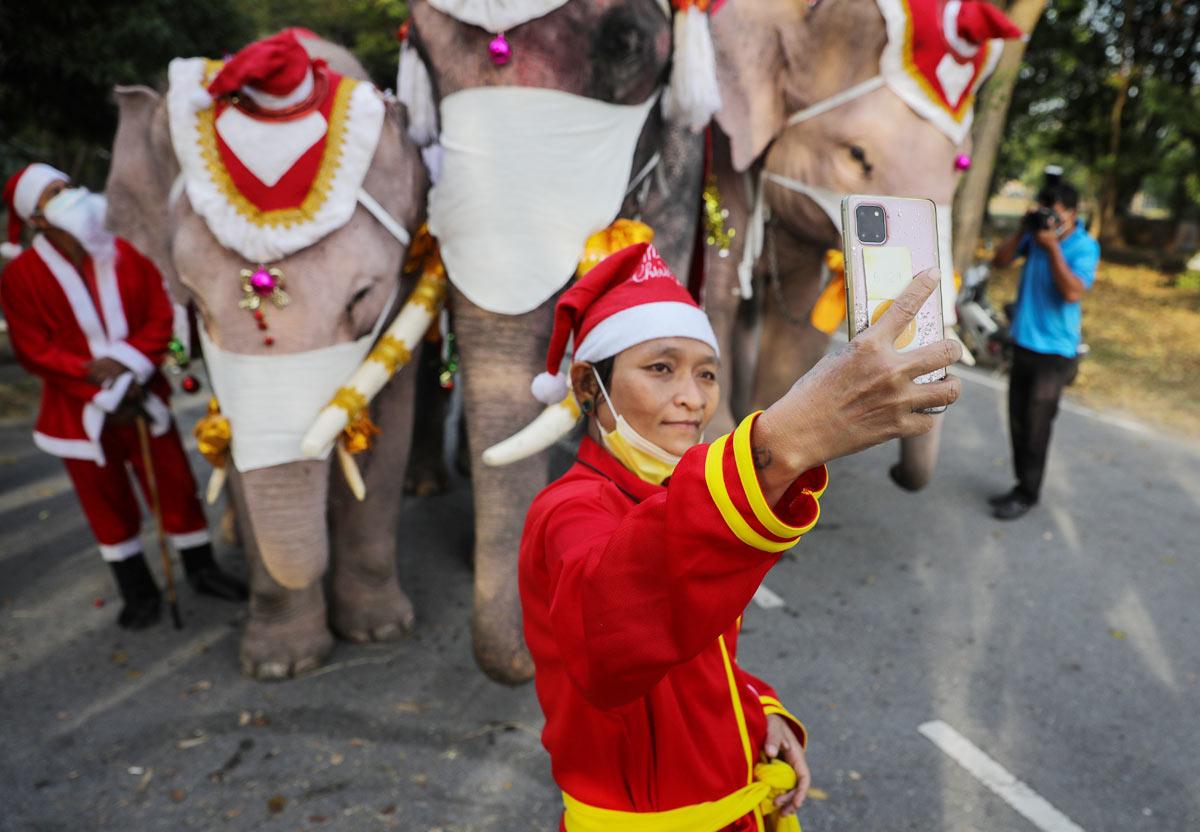 Santa Claus in Thailand delivers face masks ahead of Christmas